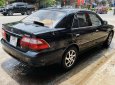 Mazda 626 2001 - Xe màu đen