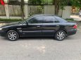 Mazda 626 2001 - Xe màu đen