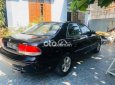 Mazda 626 1994 - Màu đen, giá 48tr