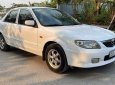 Mazda 323 2003 - Đổ xăng là vi vu