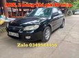 Mazda 323 2003 - Xe màu đen