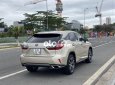 Lexus RX 200  T   2015 - Cần bán lại xe Lexus RX 200T sản xuất 2015, màu vàng còn mới