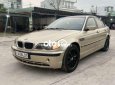 BMW 318i 2002 - Bán xe BMW 318i sản xuất năm 2002, màu vàng