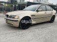 BMW 318i 2002 - Bán xe BMW 318i sản xuất năm 2002, màu vàng