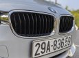 BMW 320i 2013 - Cần bán gấp BMW 320i sản xuất 2013, màu bạc, giá tốt