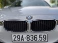 BMW 320i 2013 - Cần bán gấp BMW 320i sản xuất 2013, màu bạc, giá tốt