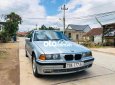 BMW 320i 2000 - Cần bán lại xe BMW 320i năm 2000, màu bạc