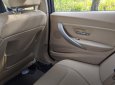 BMW 320i 2013 - Cần bán gấp BMW 320i sản xuất 2013, màu bạc, giá tốt