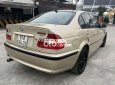 BMW 318i 2002 - Bán xe BMW 318i sản xuất năm 2002, màu vàng