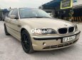 BMW 318i 2002 - Bán xe BMW 318i sản xuất năm 2002, màu vàng