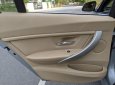 BMW 320i 2013 - Cần bán gấp BMW 320i sản xuất 2013, màu bạc, giá tốt