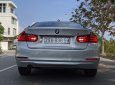 BMW 320i 2013 - Cần bán gấp BMW 320i sản xuất 2013, màu bạc, giá tốt