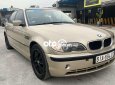 BMW 318i 2002 - Bán xe BMW 318i sản xuất năm 2002, màu vàng