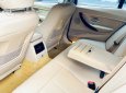 BMW 330i      2016 - Cần bán lại xe BMW 320i năm 2016, màu trắng, xe nhập, giá 955tr