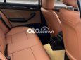 BMW 318i 2002 - Bán xe BMW 318i sản xuất năm 2002, màu vàng