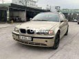 BMW 318i 2002 - Bán xe BMW 318i sản xuất năm 2002, màu vàng