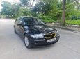 BMW 318i 2004 - Màu đen, xe nhập