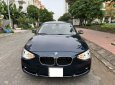 BMW 116i 2014 - Bản Hachback, màu xanh cavansite