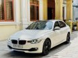 BMW 320i 2014 - Màu trắng, giá cực tốt