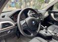 BMW 116i 2014 - Bản Hachback, màu xanh cavansite