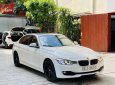 BMW 320i 2014 - Màu trắng, giá cực tốt