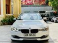 BMW 320i 2014 - Màu trắng, giá cực tốt