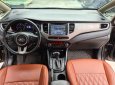 Kia Rondo 2015 - Số tự động, màu nâu, odo 77000km, biển TPHCM. Tặng 100% lệ phí trước bạ