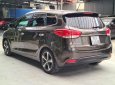 Kia Rondo 2015 - Số tự động, màu nâu, odo 77000km, biển TPHCM. Tặng 100% lệ phí trước bạ