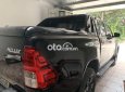 Toyota Hilux Bán xe  2.4E, màu đen, 1 cầu STĐ, ĐK T7/2021. 2021 - Bán xe Hilux 2.4E, màu đen, 1 cầu STĐ, ĐK T7/2021.