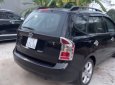 Kia Carens 2009 - Màu đen số sàn, giá 188tr