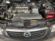Mazda 626 2003 - Xe màu đen, giá 135tr