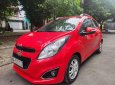 Chevrolet Spark 2014 - Cần bán xe auto, màu đỏ, gia đình sử dụng mới 95%