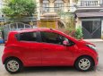 Chevrolet Spark 2014 - Cần bán xe auto, màu đỏ, gia đình sử dụng mới 95%