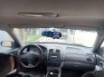 Mazda 323 Bán xe   màu đen, sx 2002. 2002 - Bán xe Mazda 323 màu đen, sx 2002.