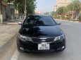 Kia Forte 2010 - Xe màu đen số sàn