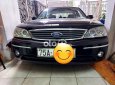 Ford Laser Bán xe   ghia 1.8 AT đời 2004 màu đen 2004 - Bán xe ford laser ghia 1.8 AT đời 2004 màu đen