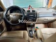 Ford Laser Bán xe   ghia 1.8 AT đời 2004 màu đen 2004 - Bán xe ford laser ghia 1.8 AT đời 2004 màu đen