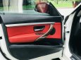 BMW 320i 2016 - Màu trắng nội thất đỏ