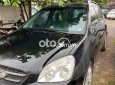 Kia Carens   2.0 2009 màu đen 2009 - KiA Carens 2.0 2009 màu đen