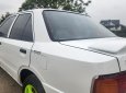 Mazda 323 1995 - Cần bán xe màu trắng