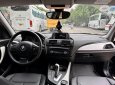 BMW 116i 1.6 turbo 2014 - Cần bán BMW 116i 1.6 turbo 2014, màu xanh cavansite