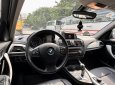 BMW 116i 1.6 turbo 2014 - Cần bán BMW 116i 1.6 turbo 2014, màu xanh cavansite