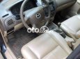 Mazda 323 .-2004 2004 - MAZDA.323-2004