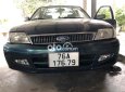 Ford Laser Nhật bản  2001 xanh xe vẫn còn nguyên rin 2001 - Nhật bản ford 2001 xanh xe vẫn còn nguyên rin