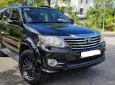 Toyota Fortuner 2015 - Chính chủ bán xe Toyota Fortuner đời 2015 màu đen nội thất kem, 2.7 một cầu máy xăng số tự động.