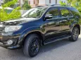 Toyota Fortuner 2015 - Chính chủ bán xe Toyota Fortuner đời 2015 màu đen nội thất kem, 2.7 một cầu máy xăng số tự động.