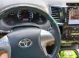 Toyota Fortuner 2015 - Chính chủ bán xe Toyota Fortuner đời 2015 màu đen nội thất kem, 2.7 một cầu máy xăng số tự động.