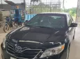 Toyota Camry 2011 - Chính chủ bán Toyota Camry đen nhập mỹ 2011, odo 75k MAY, 460tr