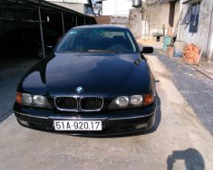 BMW 5 Series 1998 - Cần bán BMW 5 Series đăng ký 1998, màu đen nhập khẩu nguyên chiếc, 215tr giá 215 triệu tại Tp.HCM