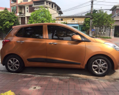 Hyundai i10 2014 - Mình bán Hyundai i10 Hatback năm 2014, màu vàng giá 425 triệu tại Tuyên Quang
